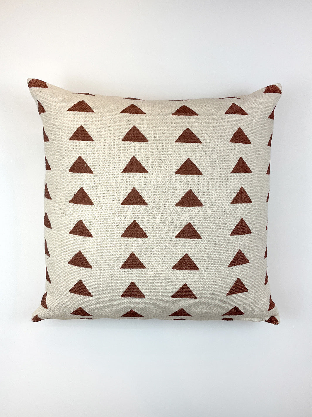 triangles throw pillow rust on california cotton
