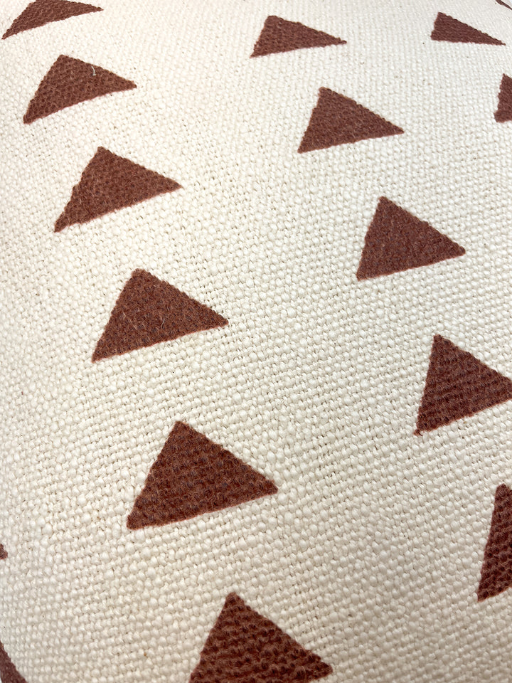 triangles throw pillow rust on california cotton