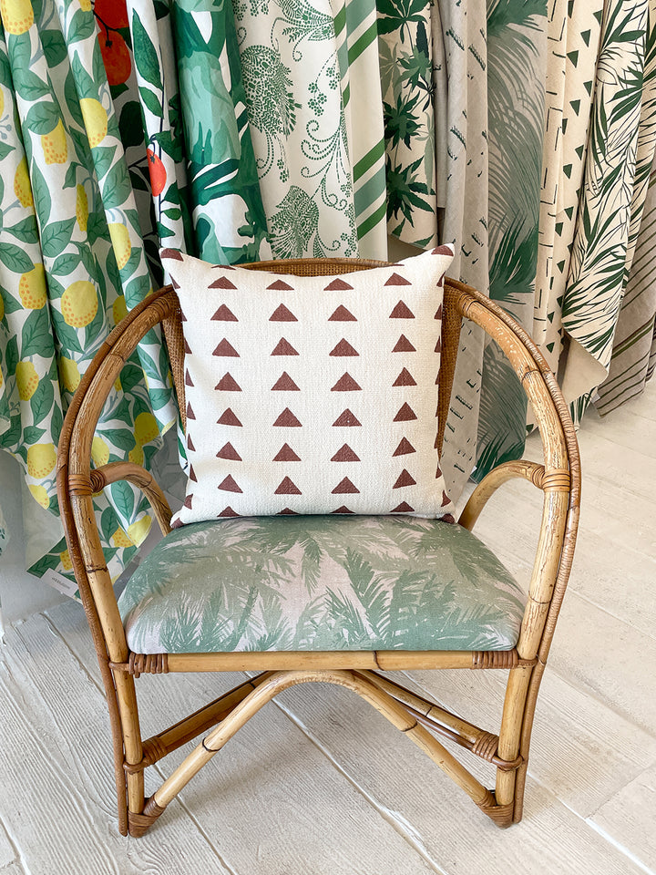 triangles throw pillow rust on california cotton