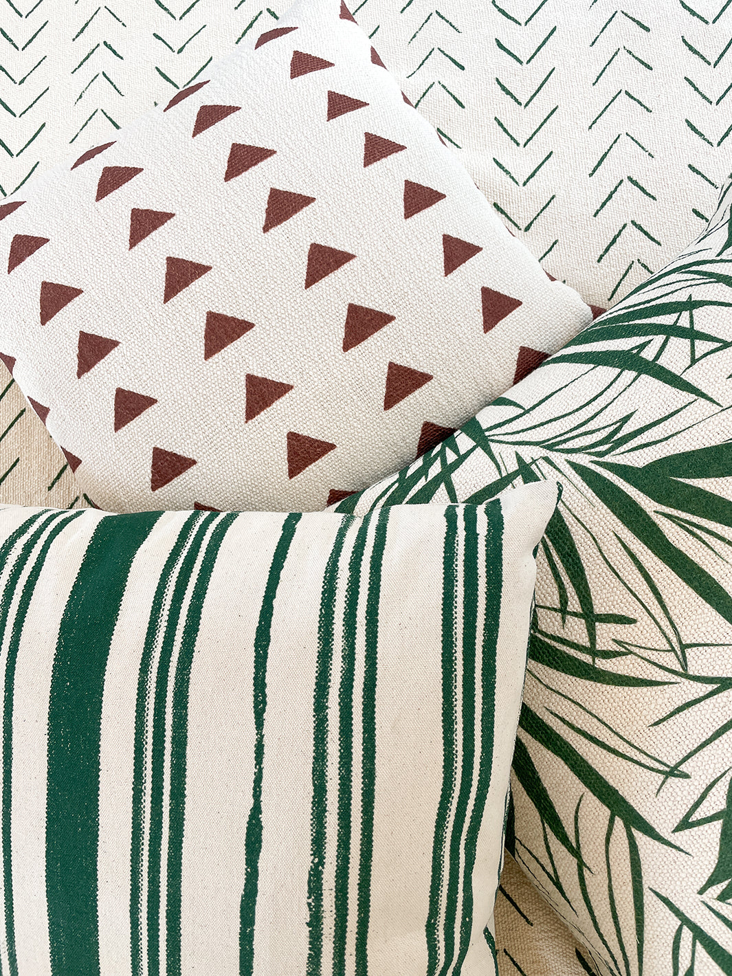 triangles throw pillow rust on california cotton