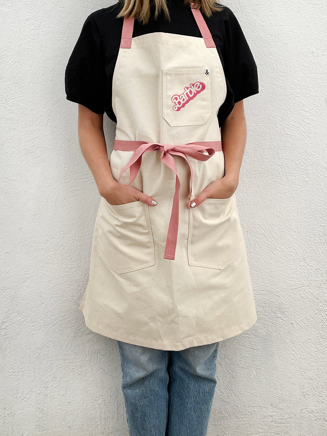 barbie x wallshoppe apron by hedley bennet 80 s logo
