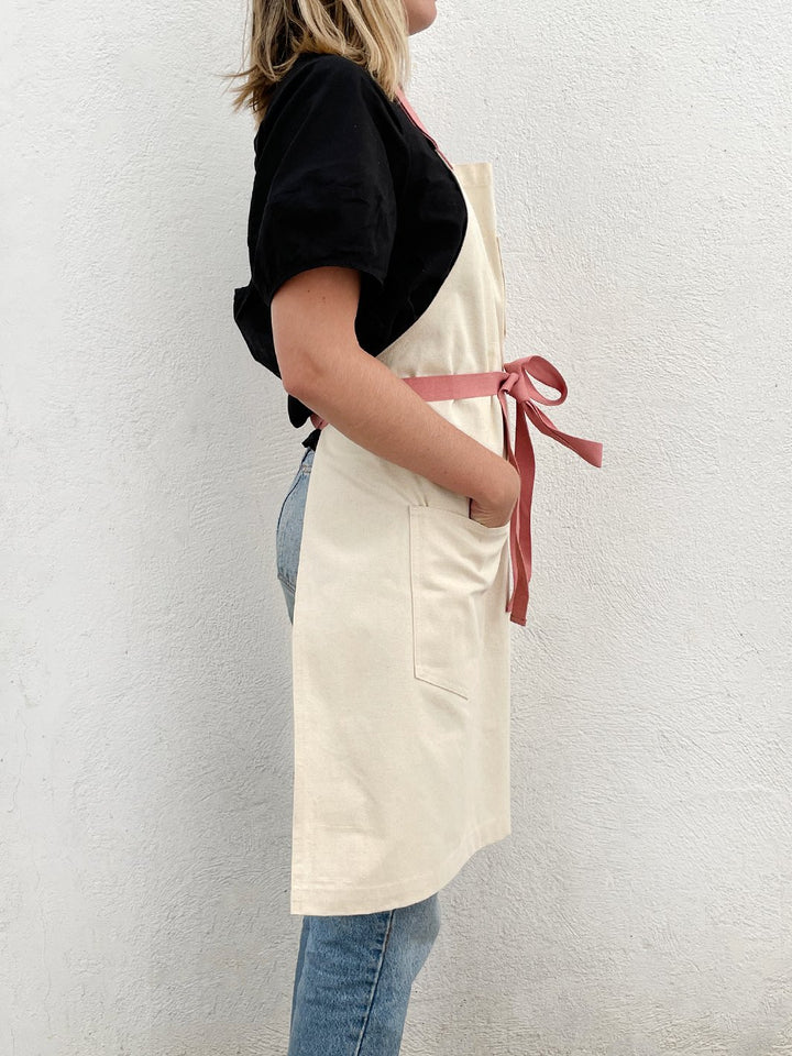 barbie x wallshoppe apron by hedley bennet 80 s logo