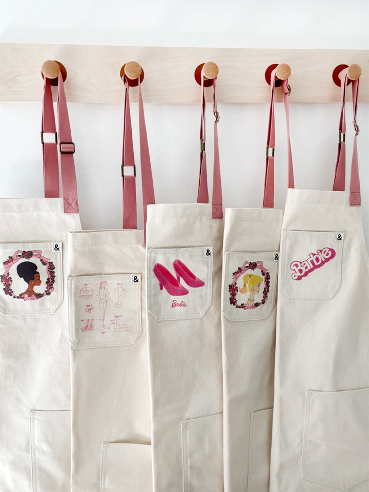barbie x wallshoppe apron by hedley bennet pink rosette
