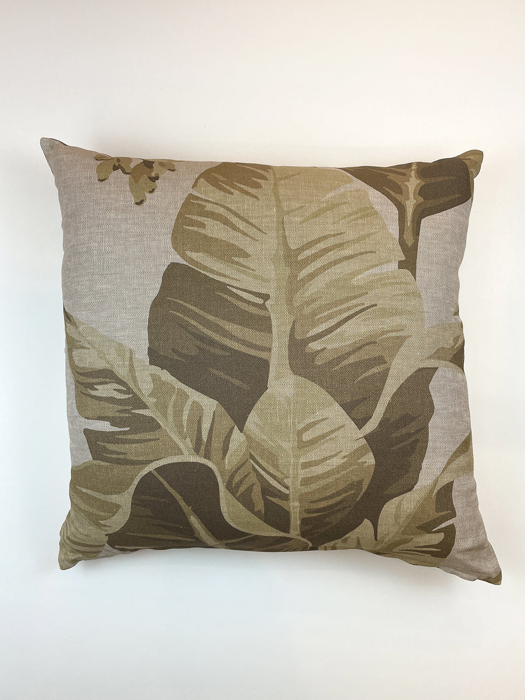 pacifico palm throw pillow cappuccino on flax linen