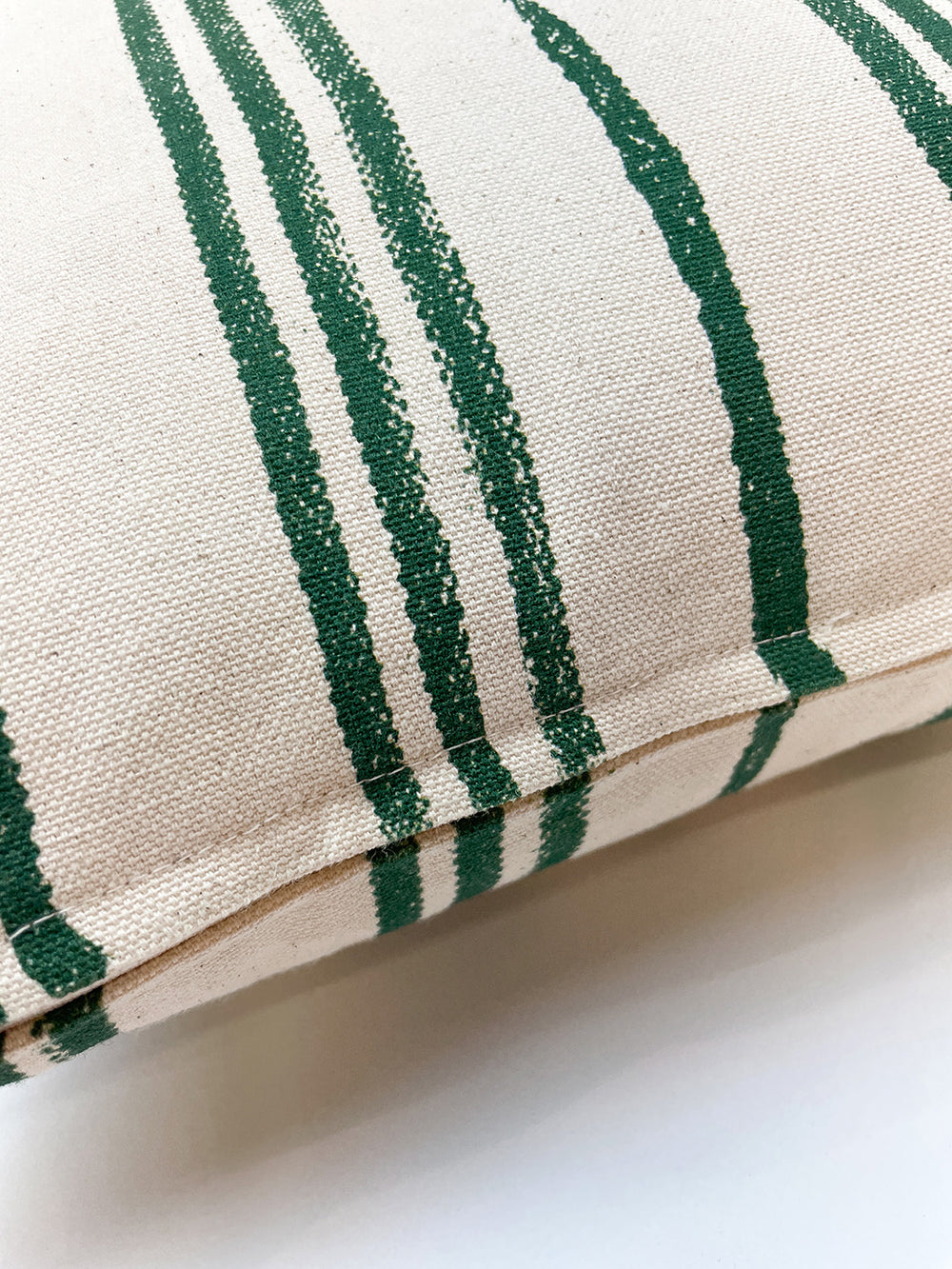 painted stripes throw pillow green on raw canvas