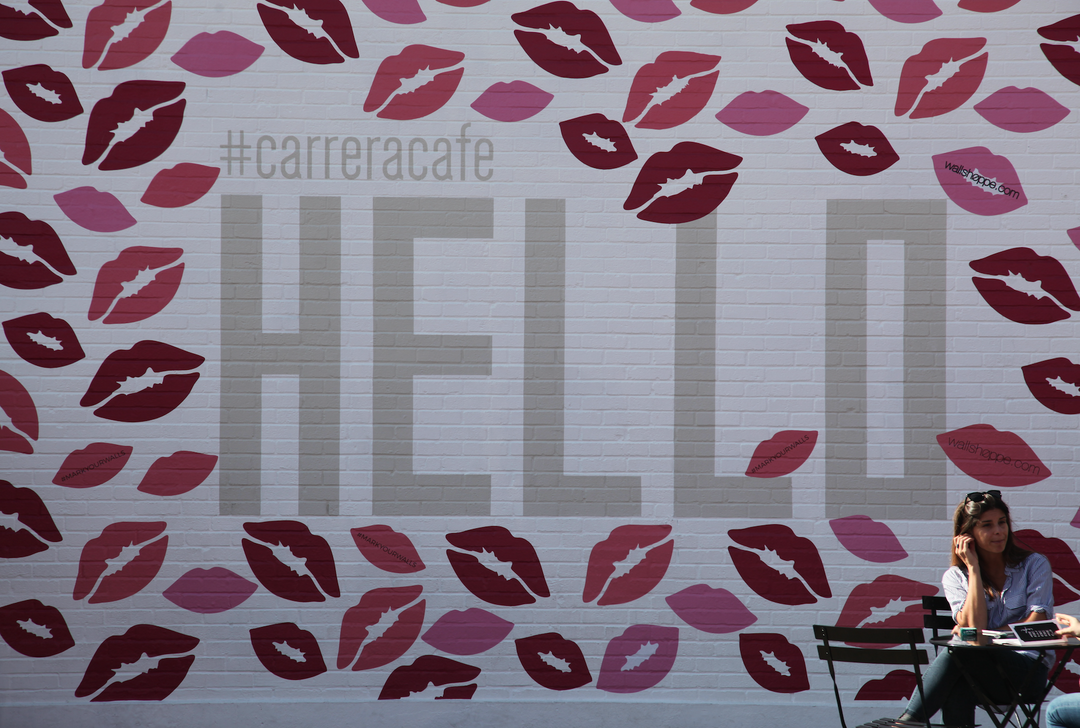 Kiss My A** by Nathan Turner x Wallshoppe Carrera Cafe Wall