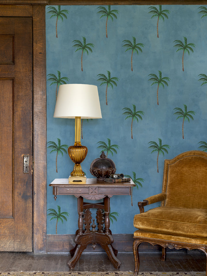 Cadet blue wallpaper panel with repeating palm tree pattern