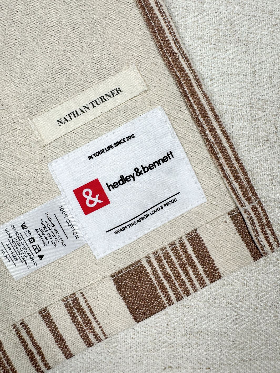 stuart stripe apron by nathan turner x hedley bennett brown