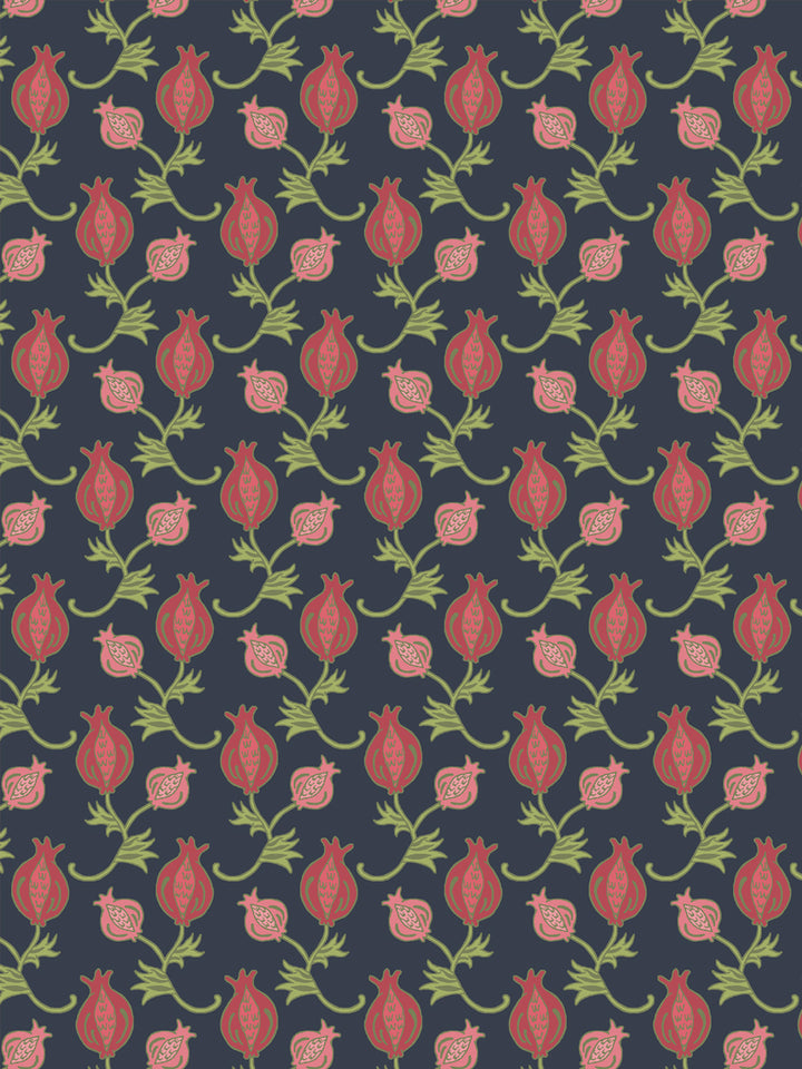 Close crop of clear red and pale coral-pink pomegranate motifs on dark navy slate blue