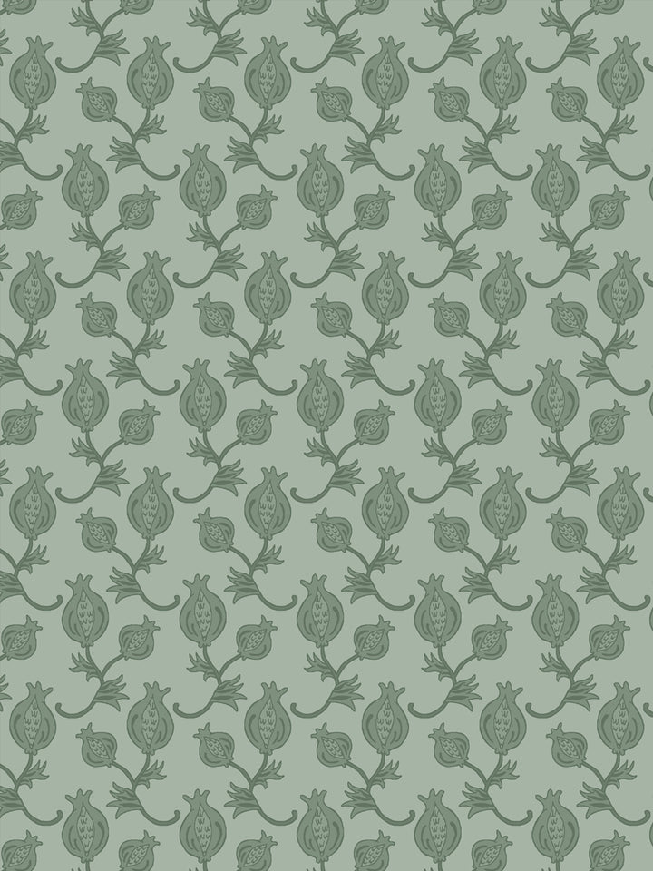 Close crop of deeper grey-green pomegranate motifs on soft grey-sage green