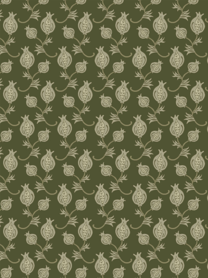 Close crop of pale khaki-cream pomegranate motifs on dark olive green