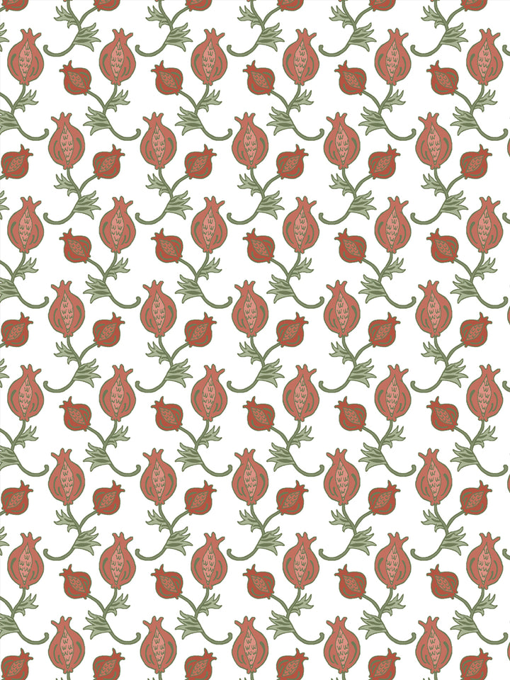 Close crop of muted terracotta brick red pomegranate motifs on clean white