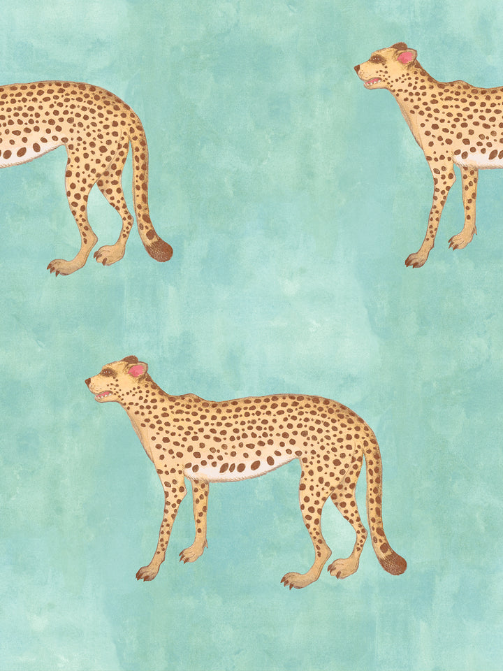 Cheetah print wallpaper with tan spots and peach faces on aqua blue ground