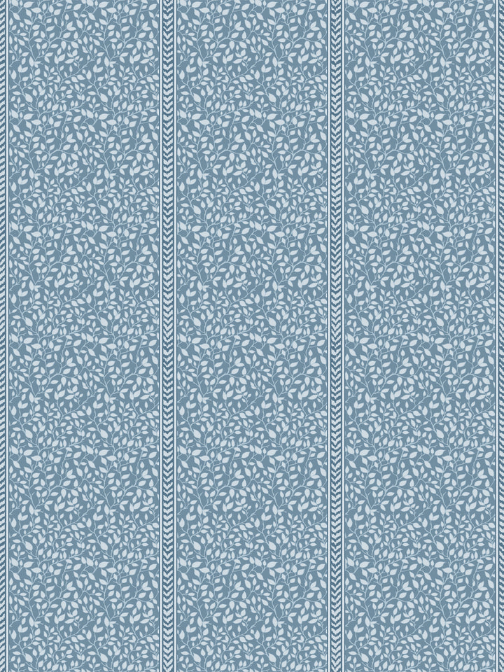Dusty blue wallpaper with pale ice-blue leaf vines in panels edged by navy flamestitch stripes