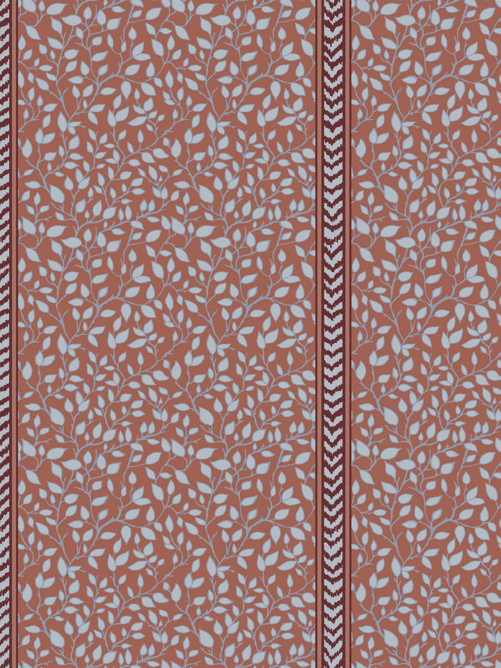 Close-up of powder blue leaves on a rust clay ground next to a maroon and white flamestitch stripe