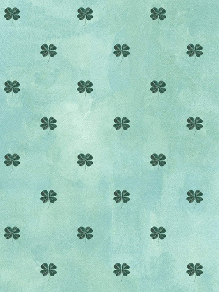 Aqua blue wallpaper with scattered four-leaf clover motifs