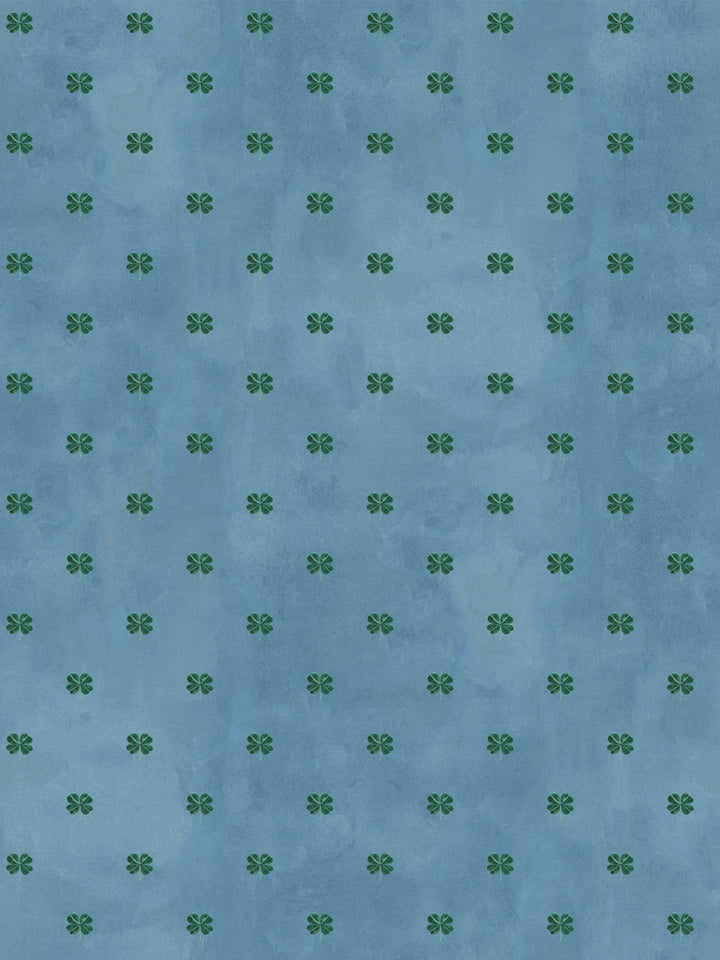 Clover-pattern wallpaper with small green four-leaf motifs on cadet blue background