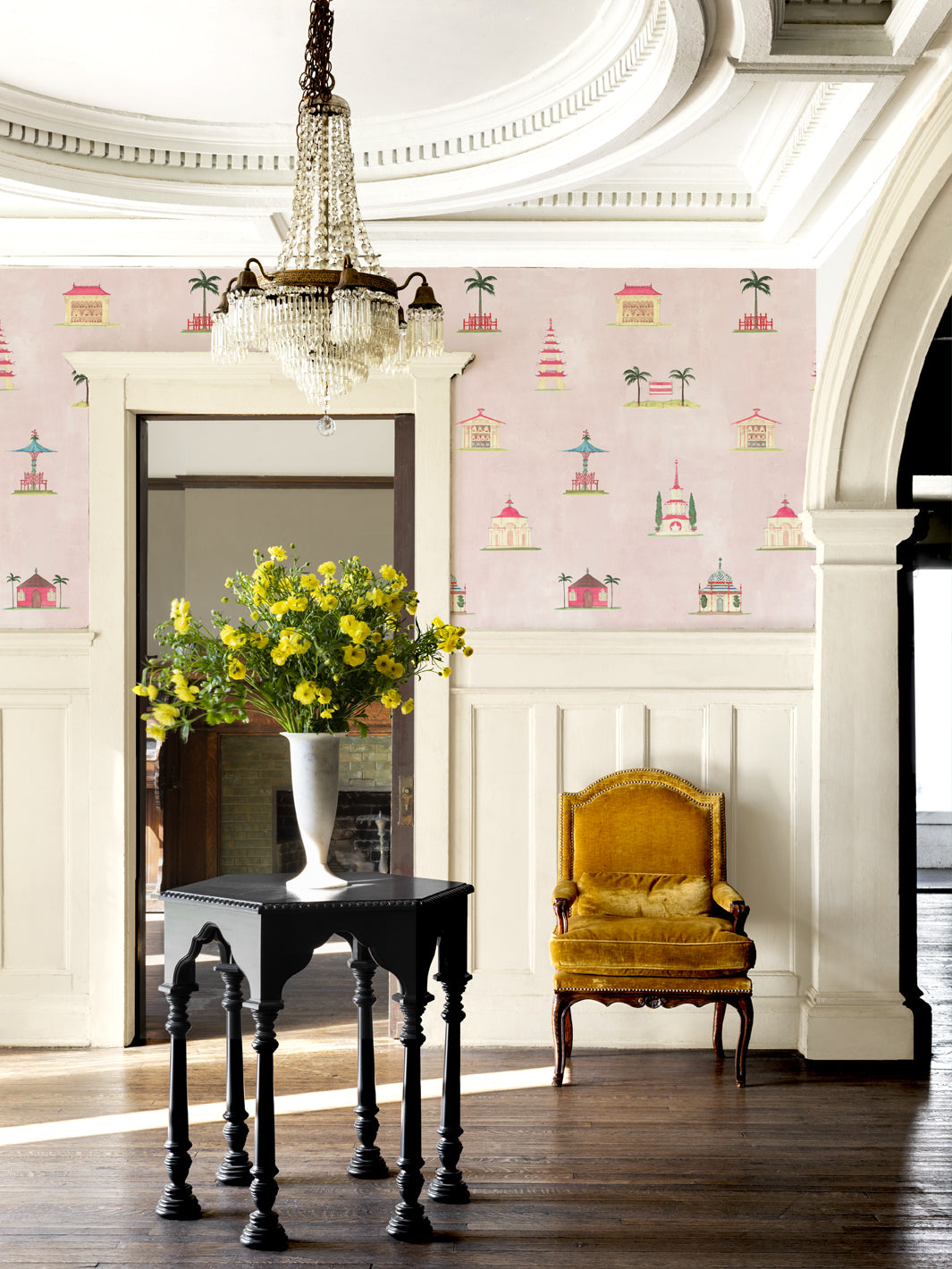 Wallpaper on interior wall with repeating colorful garden pagoda buildings pattern
