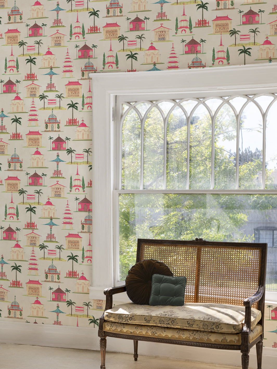 Ivory wallpaper with repeating pagodas, palm trees, and flags; shown on interior wall
