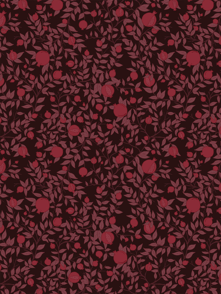 Pomegranate branch wallpaper with crimson fruit and dusty mauve leaves on a near-black brown ground