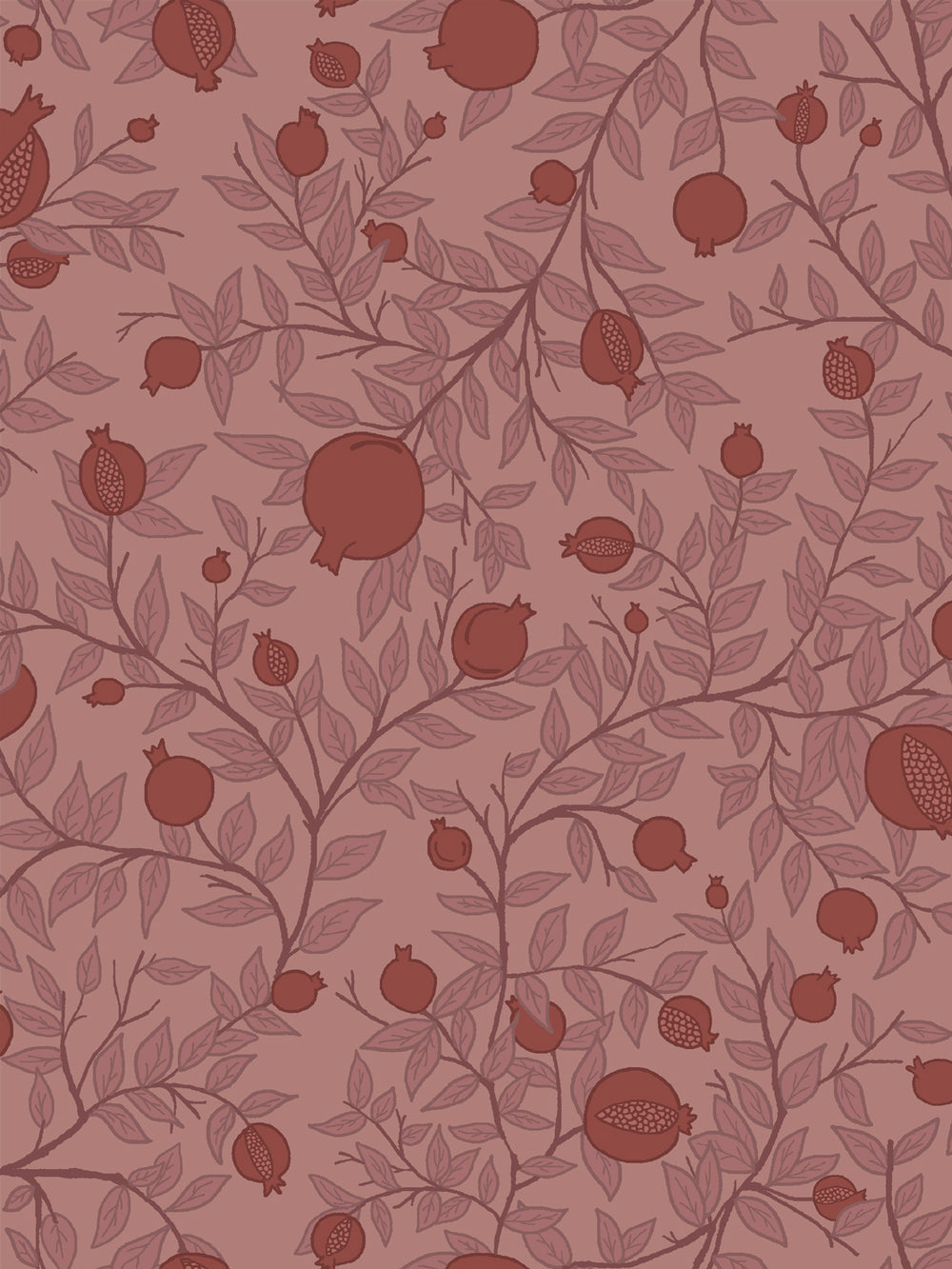 Close crop of oxblood and brick red pomegranate fruit on dusty rose clay pink