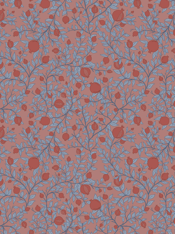 Pomegranate branch wallpaper with rust red fruit and powder blue leaves on a dusty clay pink ground