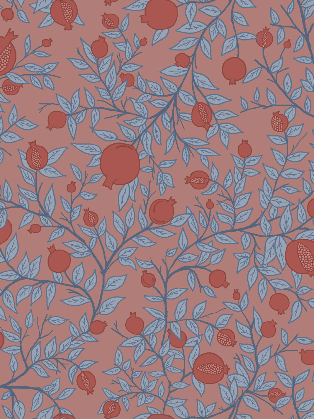 Close crop of brick and rust red pomegranate fruit on dusty clay pink
