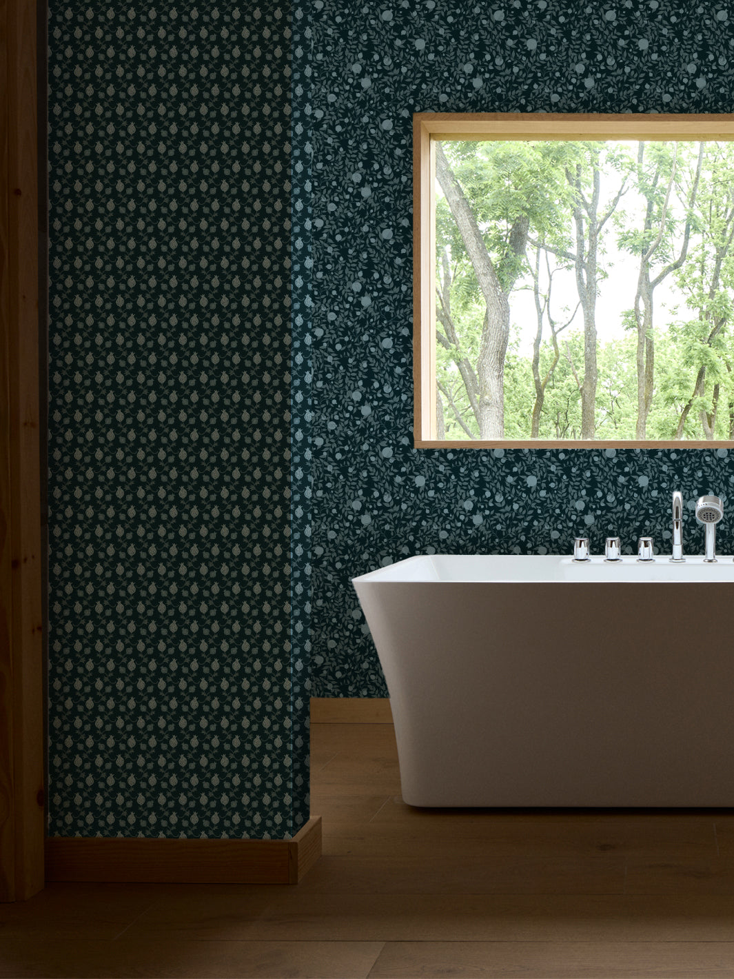 White freestanding tub and chrome faucet by a window, walls in dark teal pomegranate paper