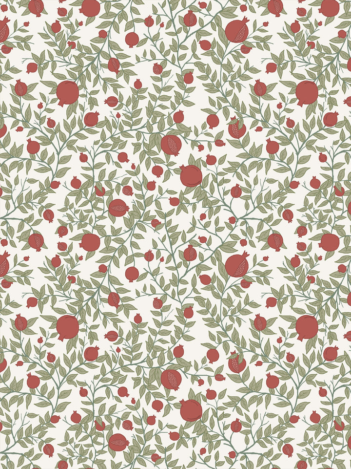 Pomegranate branch wallpaper with brick red fruit and sage green leaves on an ivory ground