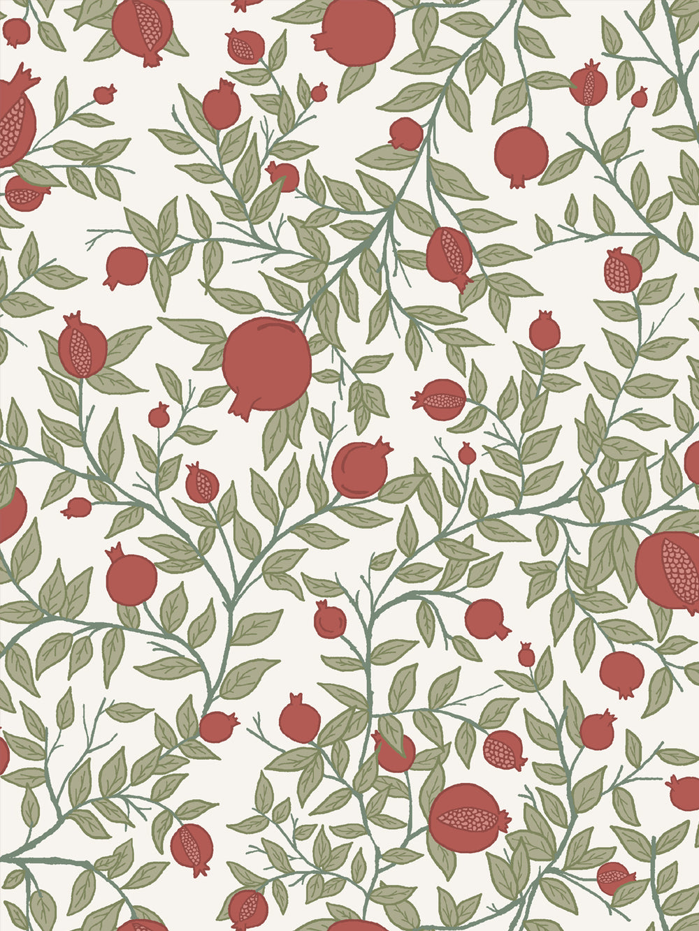 Close crop of brick red pomegranate fruit on ivory off-white