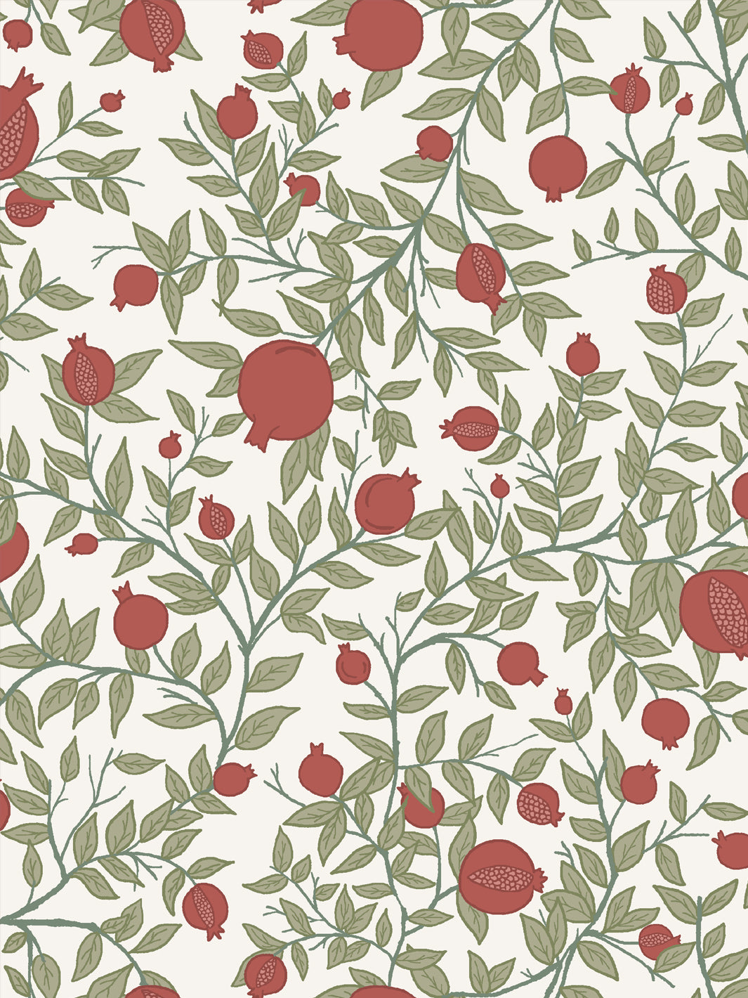 Close crop of brick red pomegranate fruit on ivory off-white