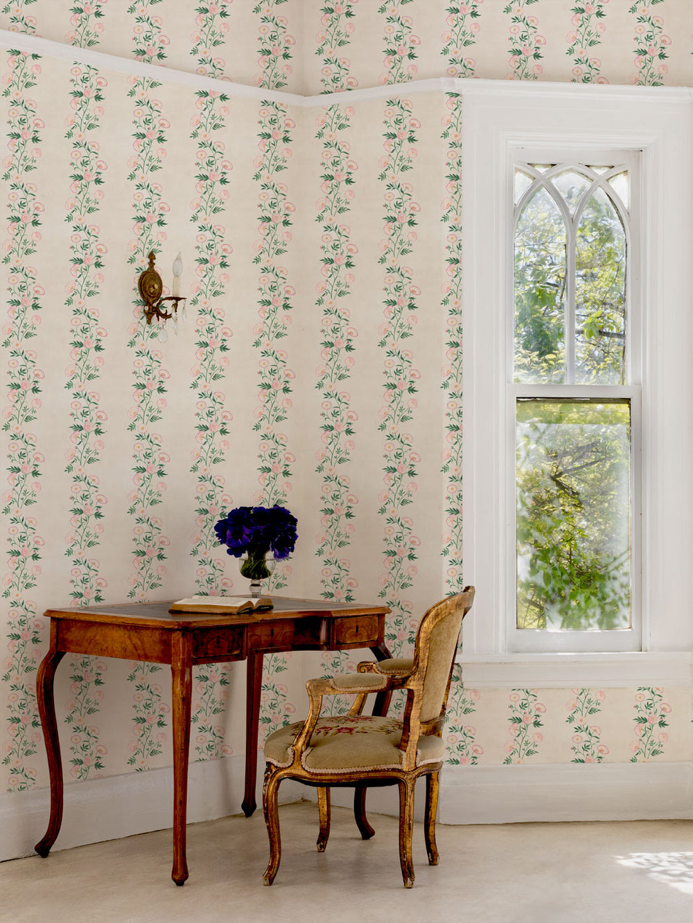 Floral stripe wallpaper in a room, ivory base with small pink flower pattern