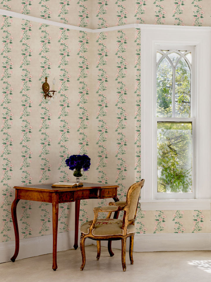 Floral wallpaper with narrow vertical stripe pattern on pale parchment walls