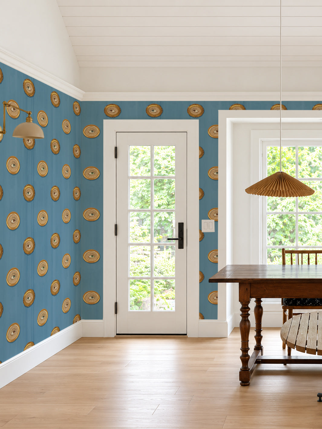 Cadet blue wallpaper with repeating multi-color eye motifs in oval frames