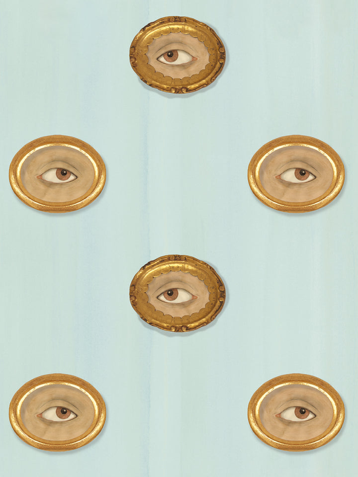 Wallpaper pattern of gold-framed oval eyes in brown tones on light blue background