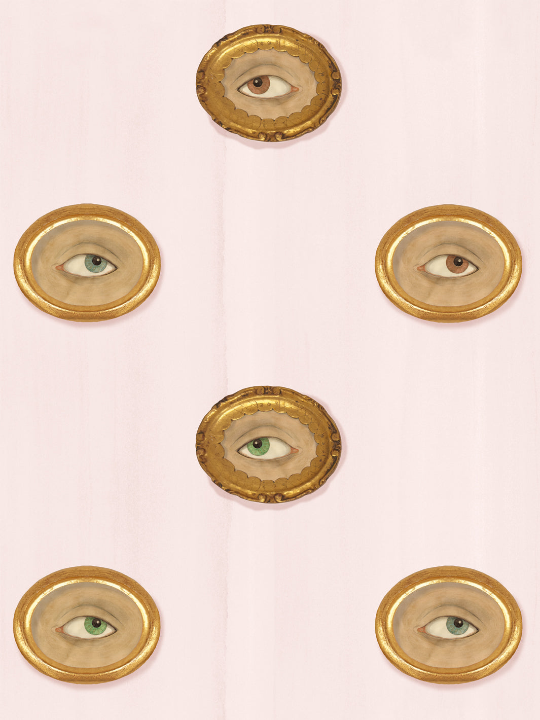 Pale blush pink wallpaper with gilt oval frames holding painted eyes in brown, green and blue-gray
