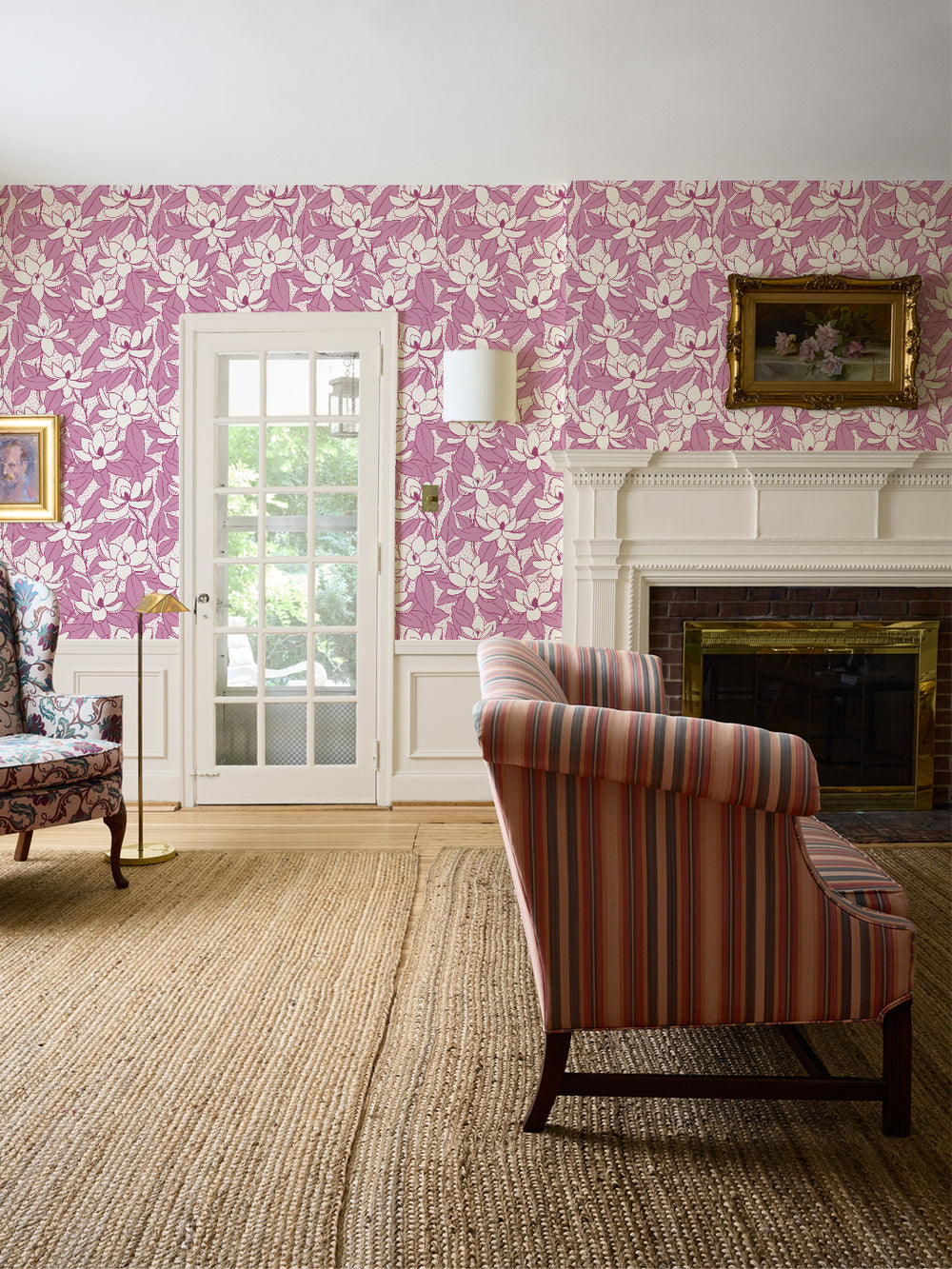 Linen Mulberry Magnolias wallpaper in a living room with striped settee, white fireplace and jute rug