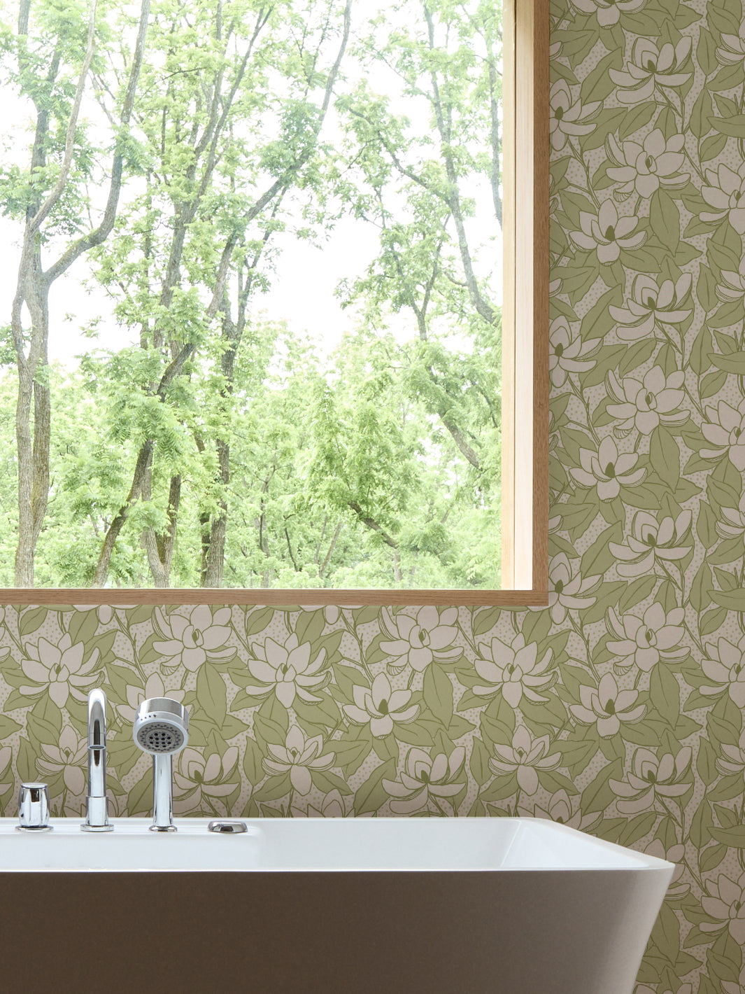 Linen Zest Magnolias wallpaper in a bathroom with white freestanding tub and oak-framed window