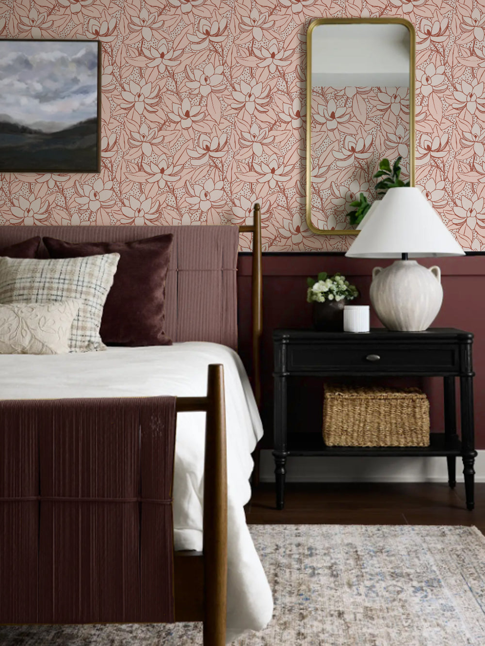 Nectar Cinnamon Magnolias wallpaper in a bedroom with plum bed, black nightstand and gold mirror