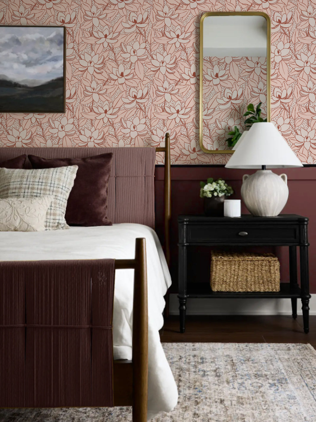 Nectar Cinnamon Magnolias wallpaper in a bedroom with plum bed, black nightstand and gold mirror