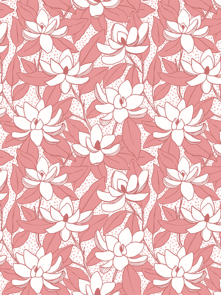 Magnolias wallpaper in Pomelo Pink: white blooms with coral pink leaves and dots on a white ground