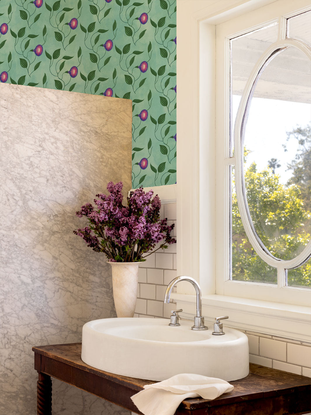 Aqua blue floral wallpaper with purple morning glory blooms and green leaves