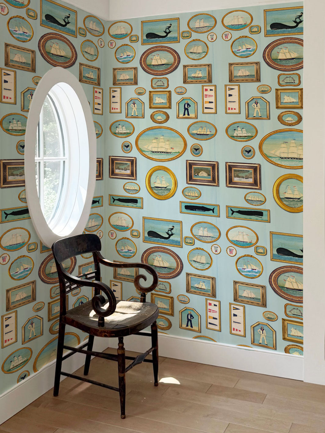 Nautical frames wallpaper covering walls, repeating blue sailing and portrait frames