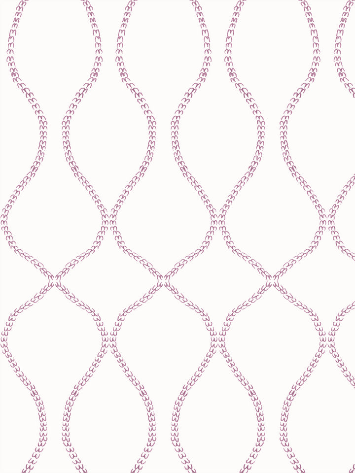 Cream wallpaper with a dusty mauve pink ogee trellis made of small hand-drawn leaves