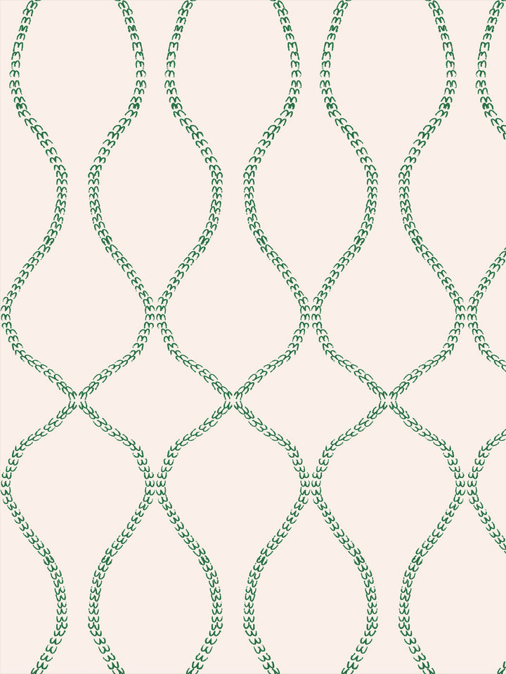 Emerald green leaf-chain trellis on a pale blush cream ground