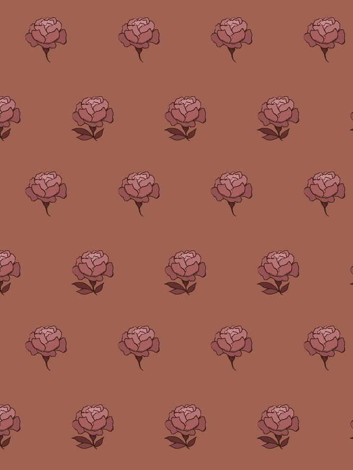 Close crop of dusty rose pink peony heads on muted terracotta clay brown