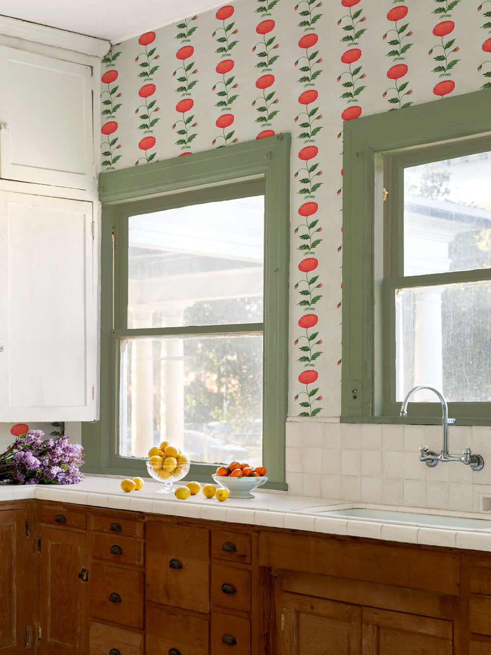 Ivory persimmon blossom wallpaper with red fruit and green leaves along window