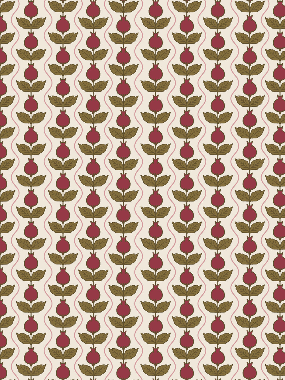 Close crop of deep crimson-wine pomegranate columns on warm cream