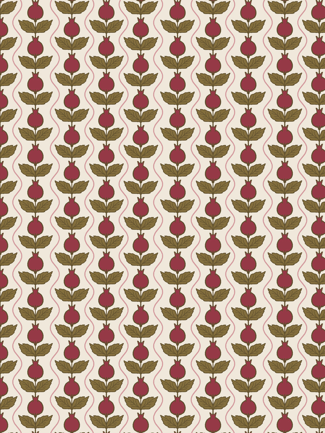 Close crop of deep crimson-wine pomegranate columns on warm cream