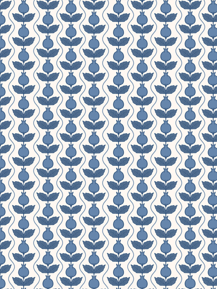 Close crop of mid cornflower blue pomegranate columns on bright warm white